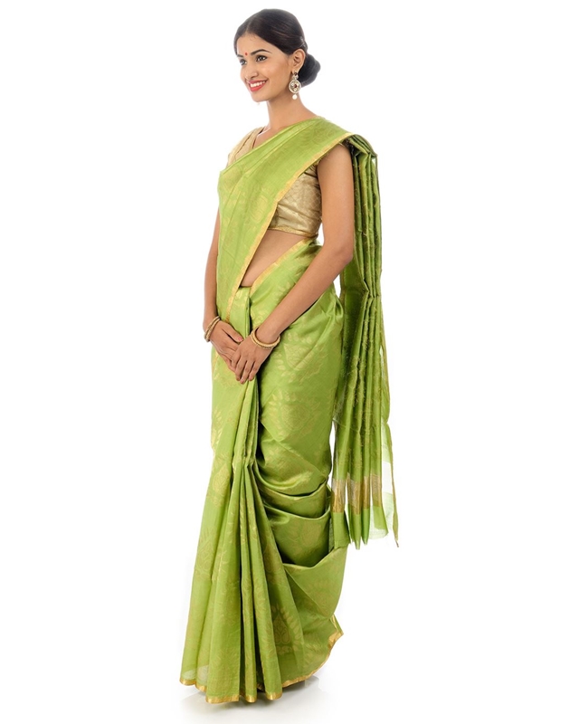 Picture of Pista Green Colored Hand Woven Cotton Shari Crafted with Lotus Art Design