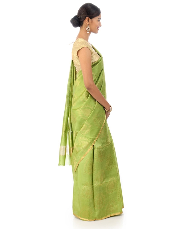 Picture of Pista Green Colored Hand Woven Cotton Shari Crafted with Lotus Art Design