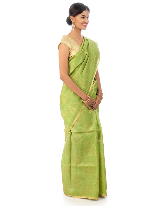 Picture of Pista Green Colored Hand Woven Cotton Shari Crafted with Lotus Art Design