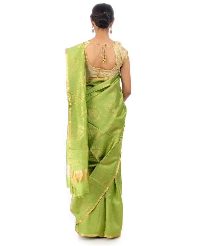 Picture of Pista Green Colored Hand Woven Cotton Shari Crafted with Lotus Art Design