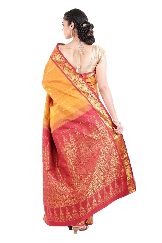 Picture of Yellow Colour Kanchipuram Silk Saree with Red Border in Zari Flower Motifs