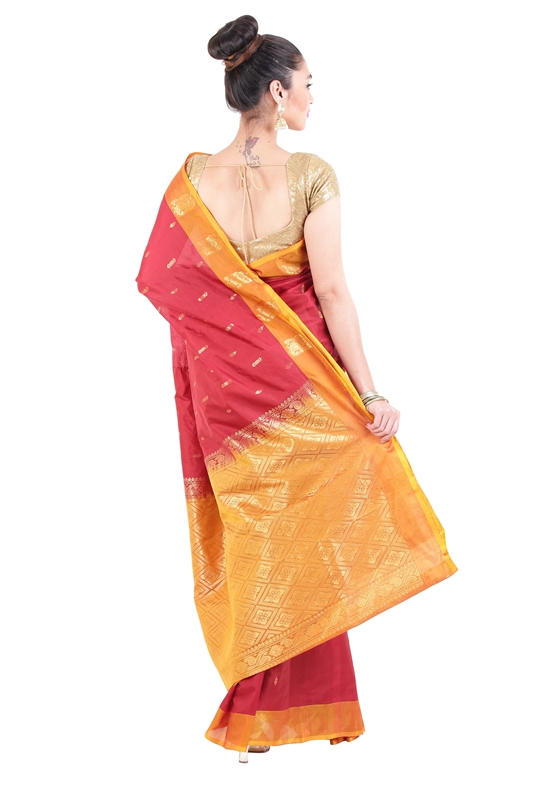 Picture of Flame Red & Yellow Dupion Silk Saree Crafted with Dotted Design Zari Border