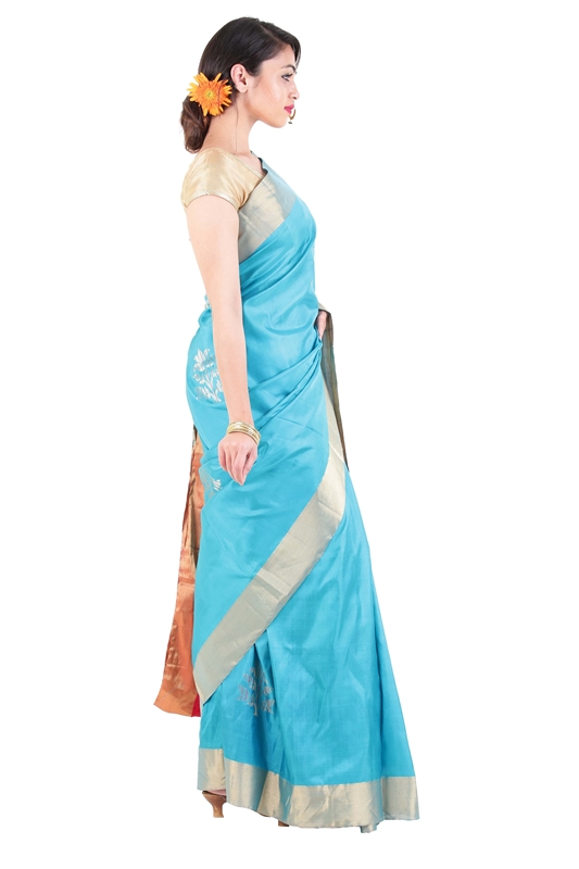 Picture of Sky Blue Uppada Silk Saree with Red Color Border in Bloomed Flowers Design 